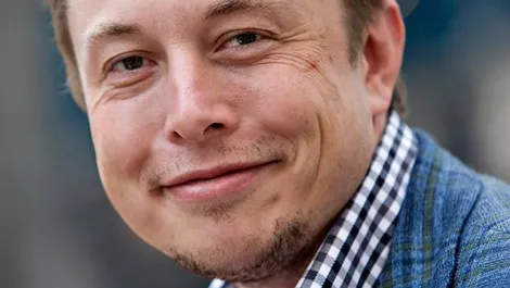 Elon Musk: Tesla's market cap higher than they deserve